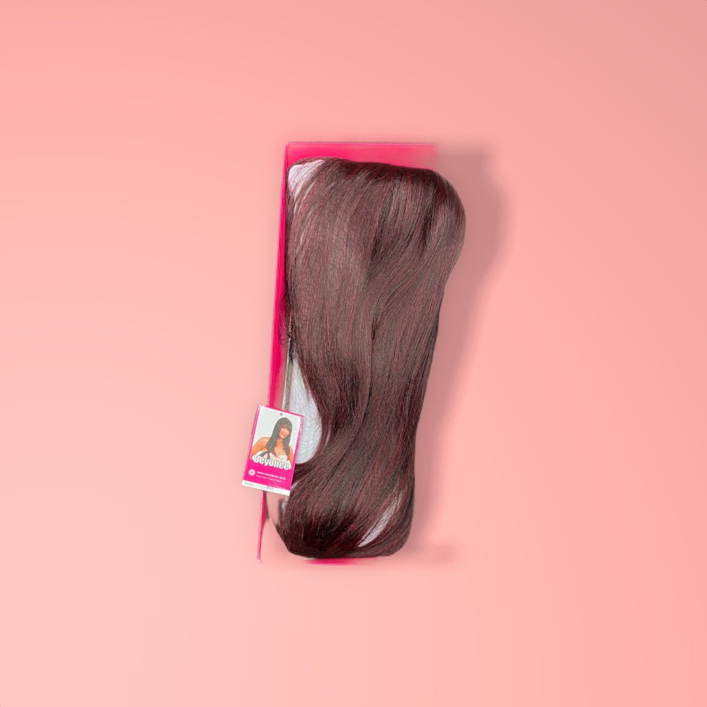 SLEEK BEYONCE Synthetic Wig in a rich 99J burgundy color, featuring long, straight strands with a smooth finish, packaged in a pink box with a label.