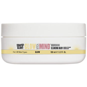 White jar with a pink lid, labeled "Glow Your Mind Nourishing Cleansing Balm," featuring yellow accents and text, 100g size, suitable for all skin types.