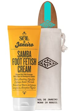 Bright yellow tube of Sol de Janeiro Samba Foot Fetish Care cream with a wooden foot file, all packaged in a beige pouch featuring the brand's logo.