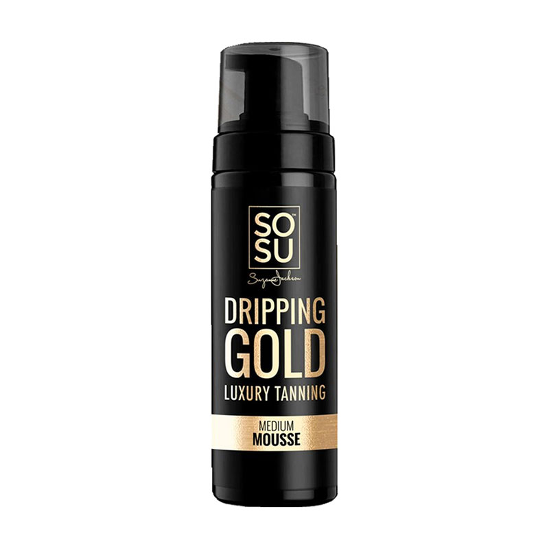 Black bottle with gold accents, featuring "Dripping Gold Luxury Tanning Mousse" label, indicating a medium shade, with a pump top for easy application.