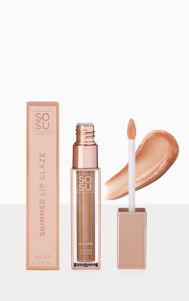 Satin lipglaze in a 6ml clear tube with a gold shimmer finish, accompanied by a soft applicator wand and a matching rose gold box labeled "Golden."