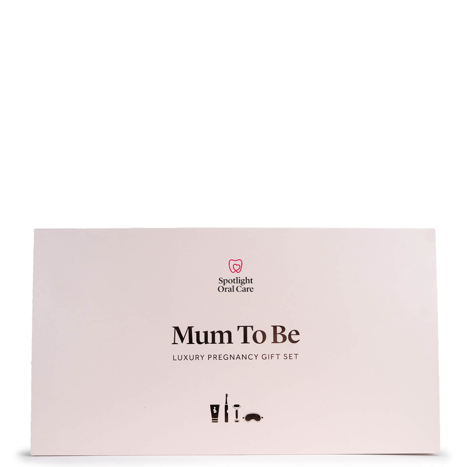 Luxury gift set box in soft pink featuring "Mum To Be" text, includes oral care products for pregnancy, elegantly designed with a clear window to showcase contents.