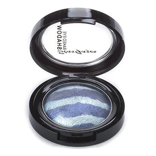 Baked duo eye shadow in denim shades, featuring a wave pattern of deep blue and lighter blue hues in a sleek black compact with a clear lid.