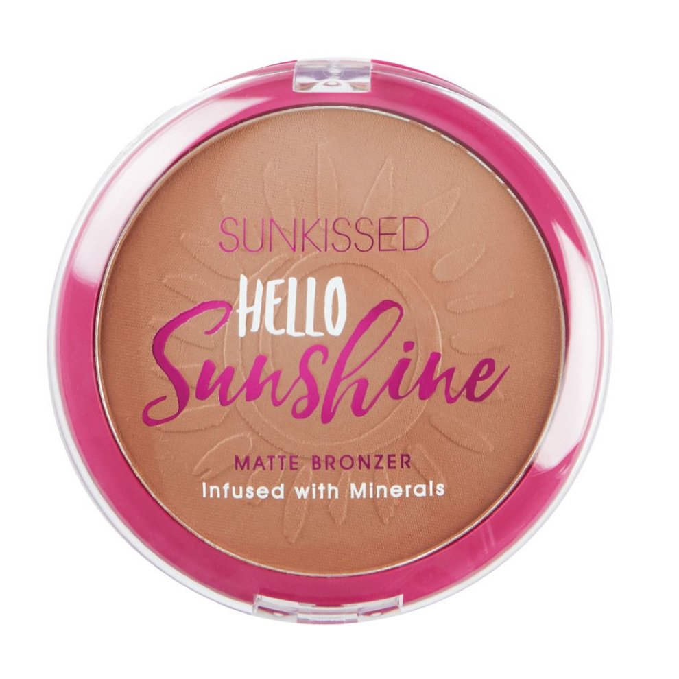 Round compact featuring a matte bronzer in a warm tan shade, with a sunburst design and bold pink lettering stating "Hello Sunshine," highlighting its mineral infusion.