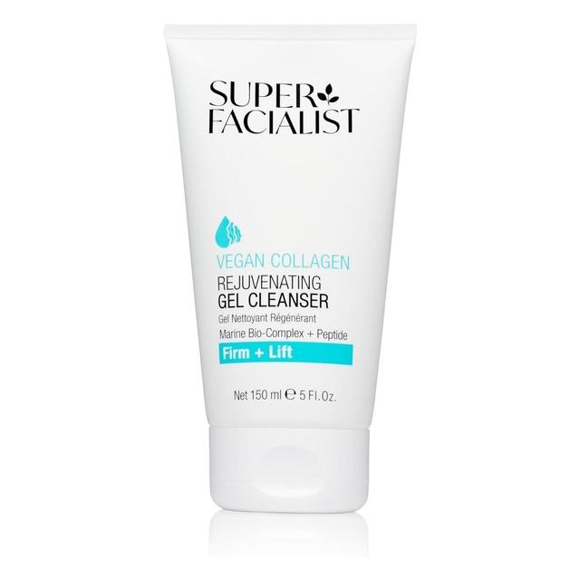 White tube of Super Facialist Vegan Collagen Deep Cleansing Gel, 150 ml, featuring a blue label with text "Firm + Lift" and "Rejuvenating Gel Cleanser."