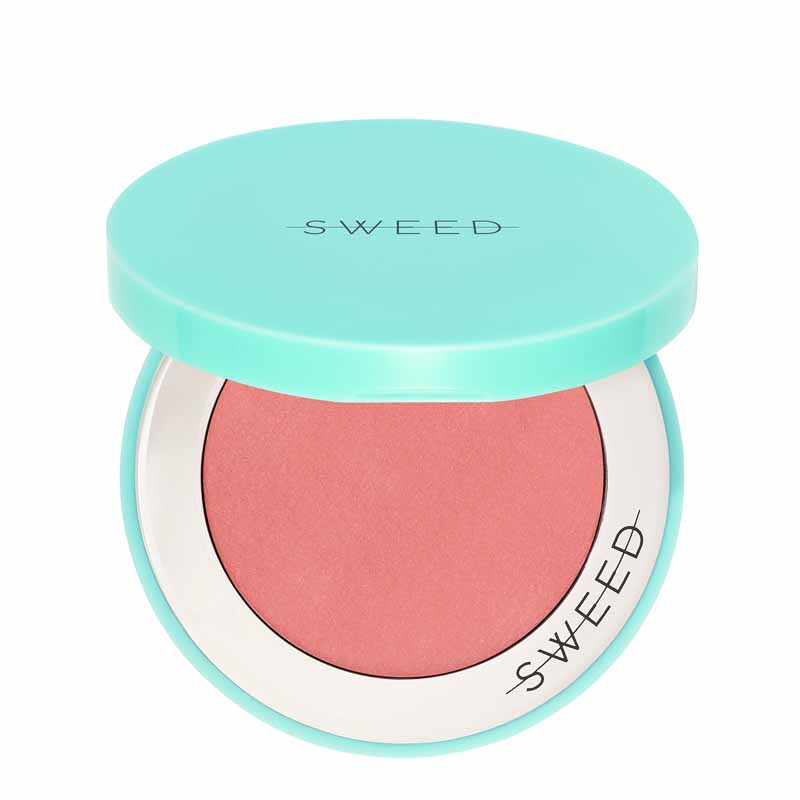 Round blush compact with a mint green lid, featuring the brand name "SWEED," containing a soft pink cream blush inside.