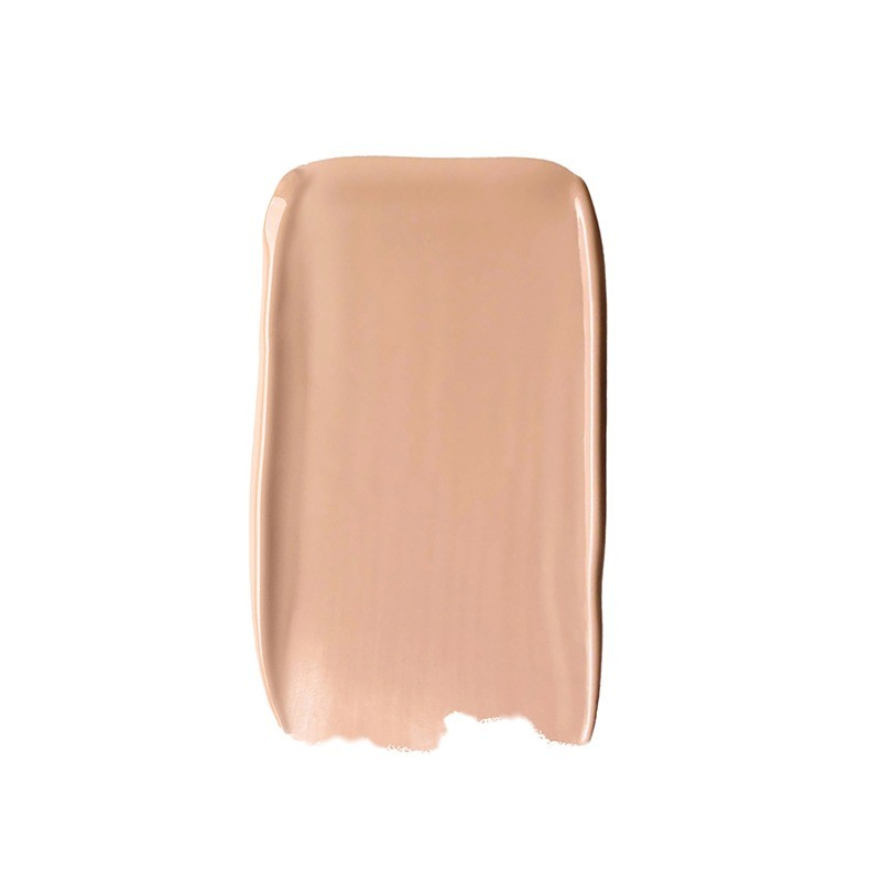 Smooth, creamy swatch of Sweed Glass Skin Foundation in a light beige shade, showcasing a glossy finish on a white background.