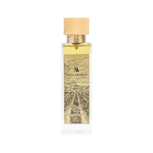 Clear glass bottle with a gold cap, featuring a golden liquid inside and intricate designs on the label, labeled "Enigma of Taif" by Swiss Arabian.