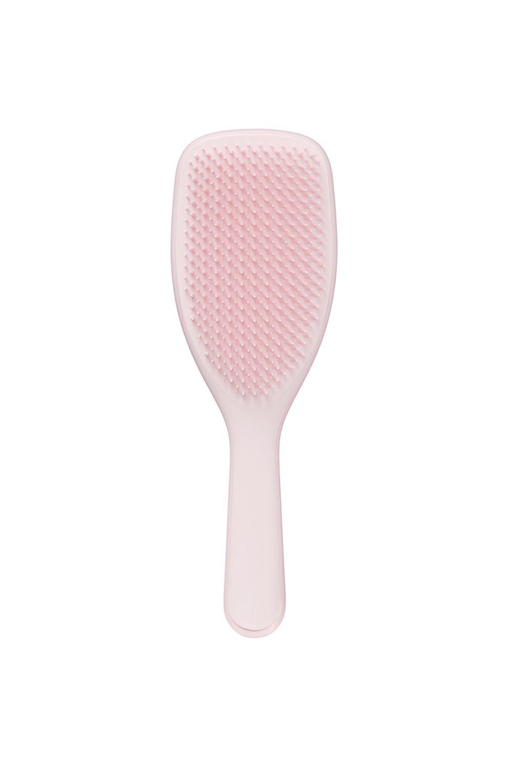 Large pink hibiscus Wet Detangling Hair Brush by Tangle Teezer features a flexible design with a textured bristle surface for gentle detangling on wet hair.