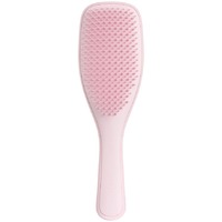 Tangle Teezer Wet Detangling Hair Brush in Millennial Pink, featuring a flexible design with soft bristles for gentle detangling on wet hair.