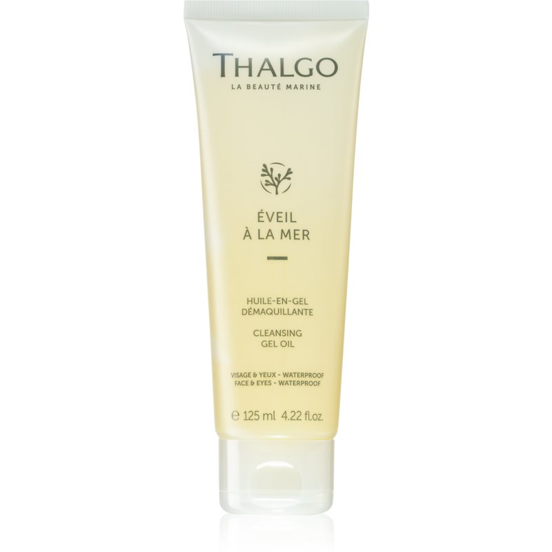 Thalgo Cleansing Gel Oil in a 125 ml translucent tube, featuring a light yellow gel, with elegant branding and a flip-top cap for easy dispensing.