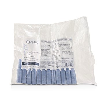 Twelve small blue glass vials of Thalgo's Salon Purete Marine Intense Regulating Concentrate, packaged in a clear plastic bag with detailed product information on the back.