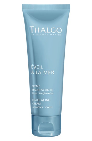 Light blue tube of Thalgo Resurfacing Cream, 50ml, featuring white text and a sleek design, emphasizing its smoothing and evening properties for skin.