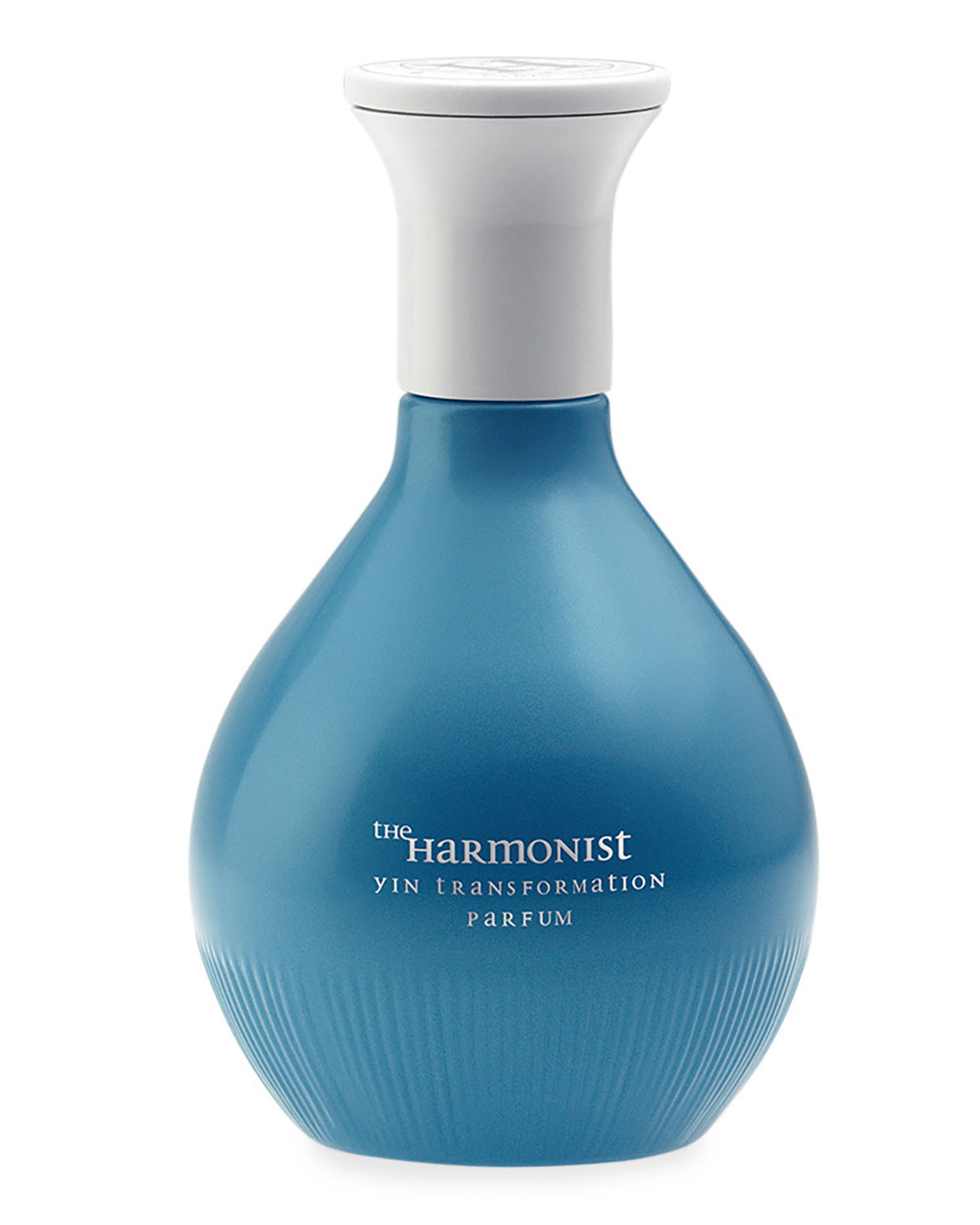 Teardrop-shaped blue glass bottle with a white cap, featuring the text "the Harmonist Yin Transformation Parfum" elegantly displayed on the front.