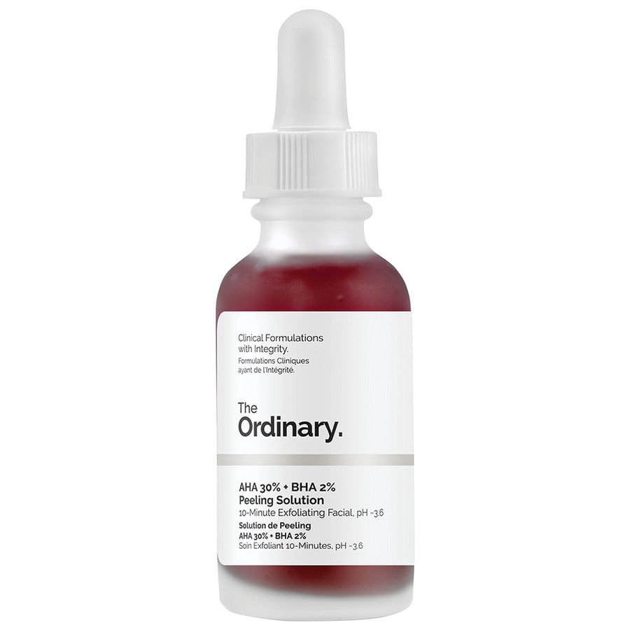 A clear glass bottle with a white dropper cap, containing a deep red liquid labeled "The Ordinary AHA 30% + BHA 2% Peeling Solution" with clinical details on the front.