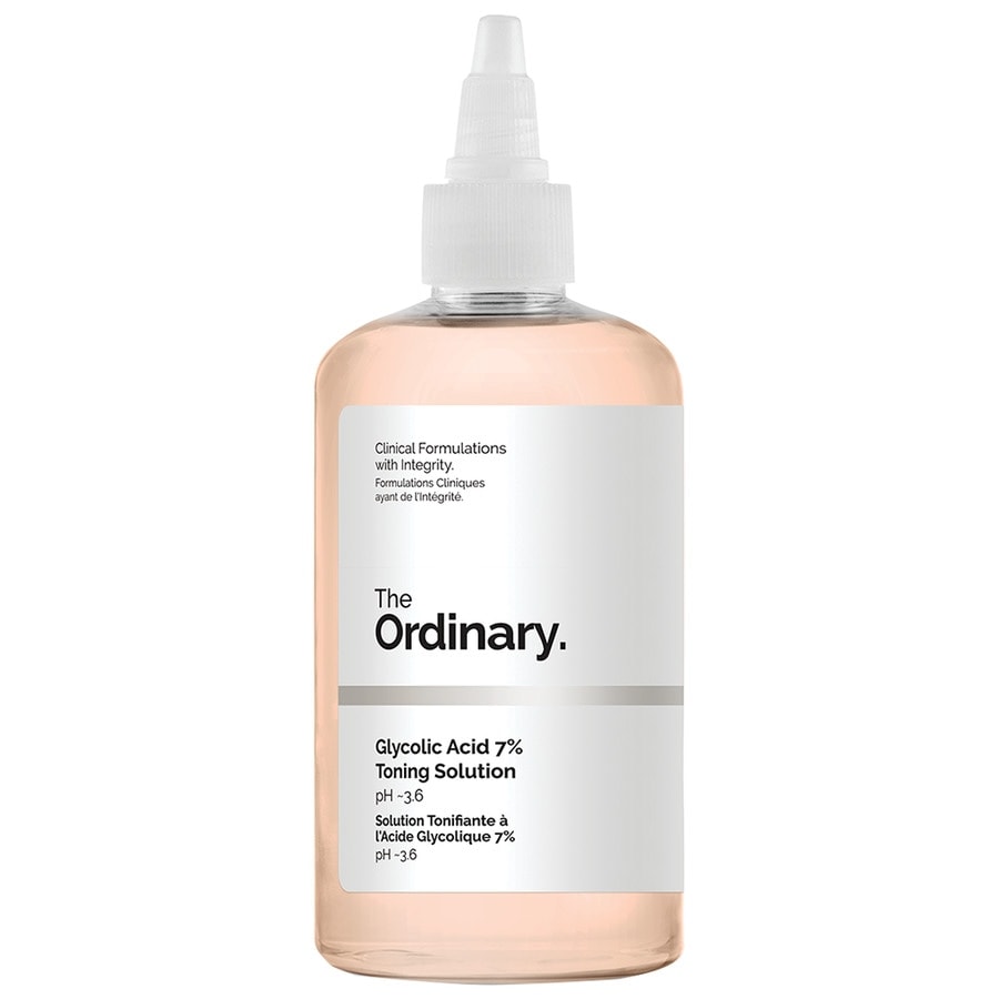 Clear plastic bottle with a white label, featuring "The Ordinary" logo and product details, containing a light pink liquid with a pump top.