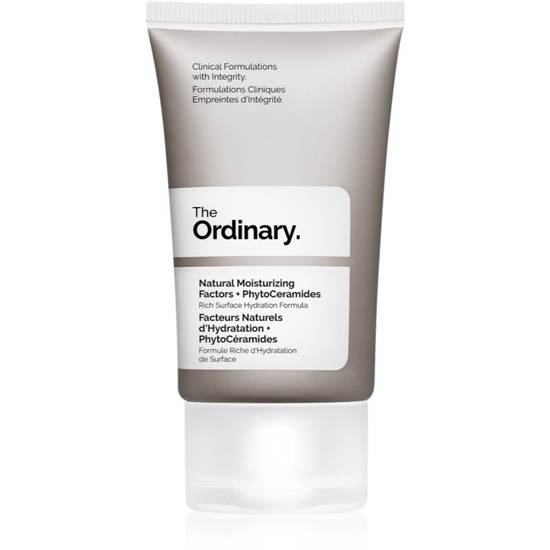 Gray tube with a white flip-top cap, labeled "The Ordinary" in bold black text, containing "Natural Moisturizing Factors + PhytoCeramides," 1 Oz / 30 Ml.