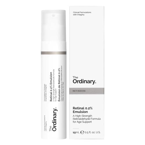 White and silver pump bottle with a sleek design, labeled "Retinal 0.2% Emulsion" in black text, alongside a matching white box, both emphasizing clinical skincare.