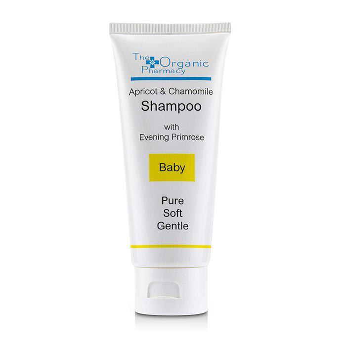 White tube of The Organic Pharmacy Apricot & Chamomile Shampoo, 3.4 oz, featuring blue and yellow accents, labeled "Baby," emphasizing gentle, pure, and soft qualities.