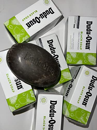 Dudu-Osun Black Soap bar in the center, surrounded by white boxes with green accents, featuring the product name and "Black Soap" text prominently displayed.