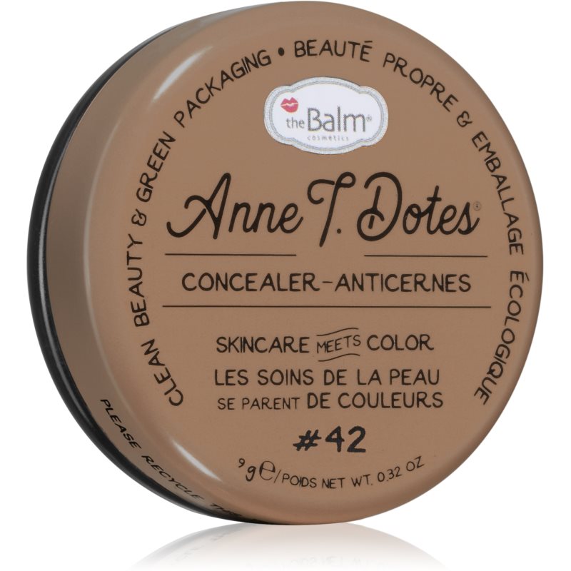 Round, brown tin container labeled "Anne T. Dotes® Concealer Anti-Redness Corrector Shade #42," featuring a white logo and text in both English and French, with a net weight of 9 g.