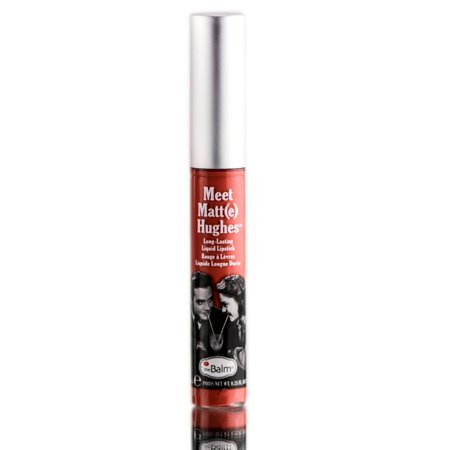 Long-lasting liquid lipstick in a sleek tube, featuring a silver cap and a bold red shade labeled "Honest," with vintage-style black and white imagery on the packaging.