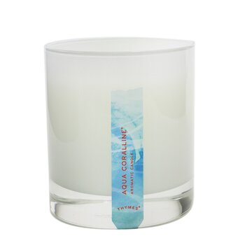 A frosted glass candle jar with a smooth white surface, featuring a blue and turquoise label that reads "Aqua Coralline" and a clear base, weighing 212g/7.5oz.