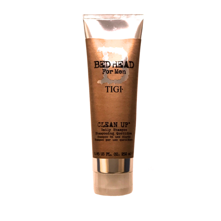 Tigi Bed Head Men Clean Up Shampoo in a 250 ml brown and white tube with a flip-top cap, featuring bold black text and a textured design.