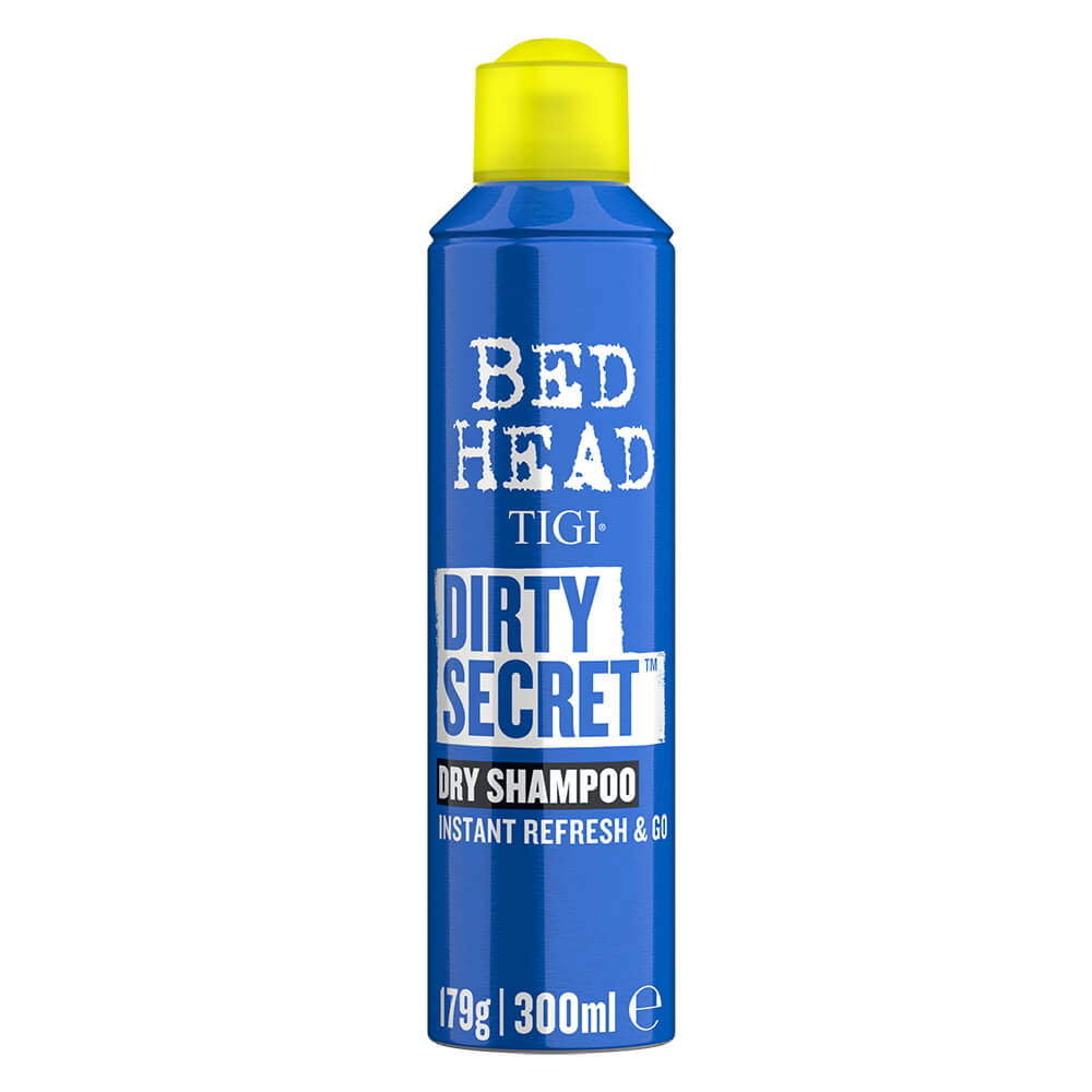 Bright blue spray can with a yellow cap, labeled "Bed Head Tigi Dirty Secret Dry Shampoo," featuring bold white text and a sleek design, containing 300 ml of product.