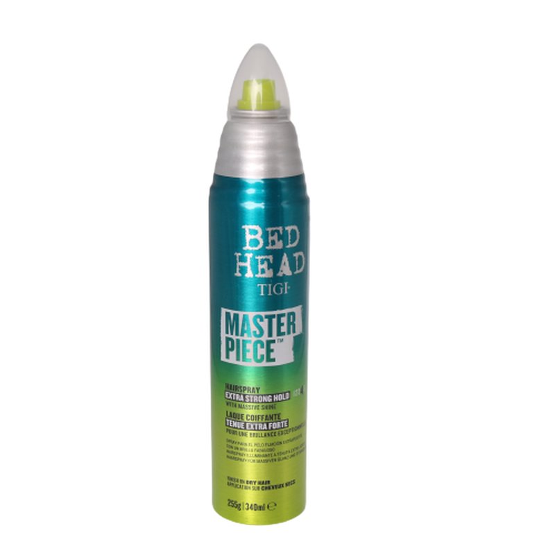A turquoise and silver aerosol can of Tigi Bed Head Master Piece Hairspray, labeled for extra strong hold, with a green nozzle and a 340mL capacity.