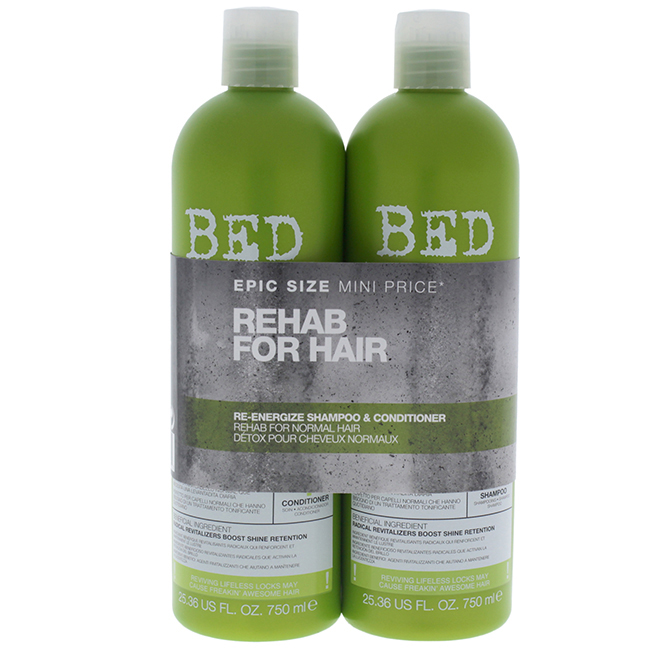 Two green bottles of Bed Head by Tigi Anti+Dotes Re-Energize Tween Duo shampoo and conditioner, each 25.36 oz, featuring bold text and a sleek design.
