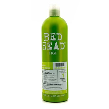 Bright green bottle of Tigi Bed Head Re-Energize Shampoo, 750ml, featuring bold white text and a flip-top cap, with detailed product information on the back.