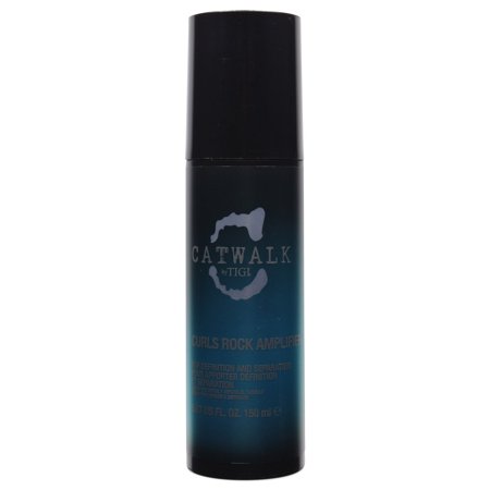 White tube of Bed Head by Tigi Curls Rock Amplifier hair cream, 150ml, featuring a black cap and blue gradient design, aimed at defining curls.