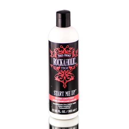 Tigi Bed Head Rockaholic Start Me Up Colour Conditioner in a 355ml bottle features a sleek design with a black background, pink accents, and bold white text.