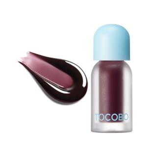 Tinted lip oil in a clear bottle with a light blue cap, featuring a dark berry shade (Black Cherry) alongside a swatch of the product, showcasing its glossy, plumping texture.