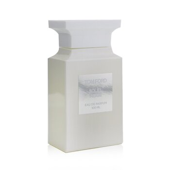 Elegant white bottle with a sleek design and a square shape, featuring a silver label that reads "Tom Ford Soleil Neige Eau De Parfum, 100ml," evoking a wintery, fresh scent.