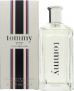 Clear glass bottle with a sleek design, featuring a silver cap and bold "tommy" label, accompanied by a striped box in red, white, and blue, containing 200ml of fragrance.