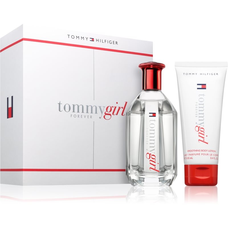 Tommy Hilfiger Tommy Girl Forever gift set featuring a clear glass perfume bottle with a red cap and a white tube of soothing body lotion, both labeled with the Tommy Girl logo.
