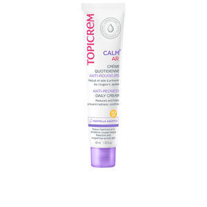 Topicrem Calm+ Anti-Redness Daily Cream SPF50+ in a white tube with purple accents, featuring a flip-top cap and clear labeling highlighting its soothing and protective properties.