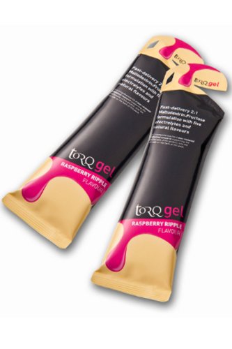 Two pouches of Torq Raspberry Ripple Energy Gel, featuring a vibrant pink and gold design, with text highlighting the raspberry flavor and fast-delivery formula.