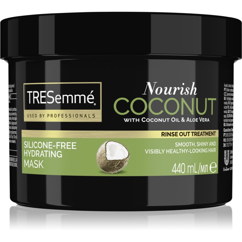 Black jar of TRESemmé Nourish Coconut Hydrating Mask, 440ml, featuring coconut oil and aloe vera, labeled as silicone-free for smooth, shiny hair.