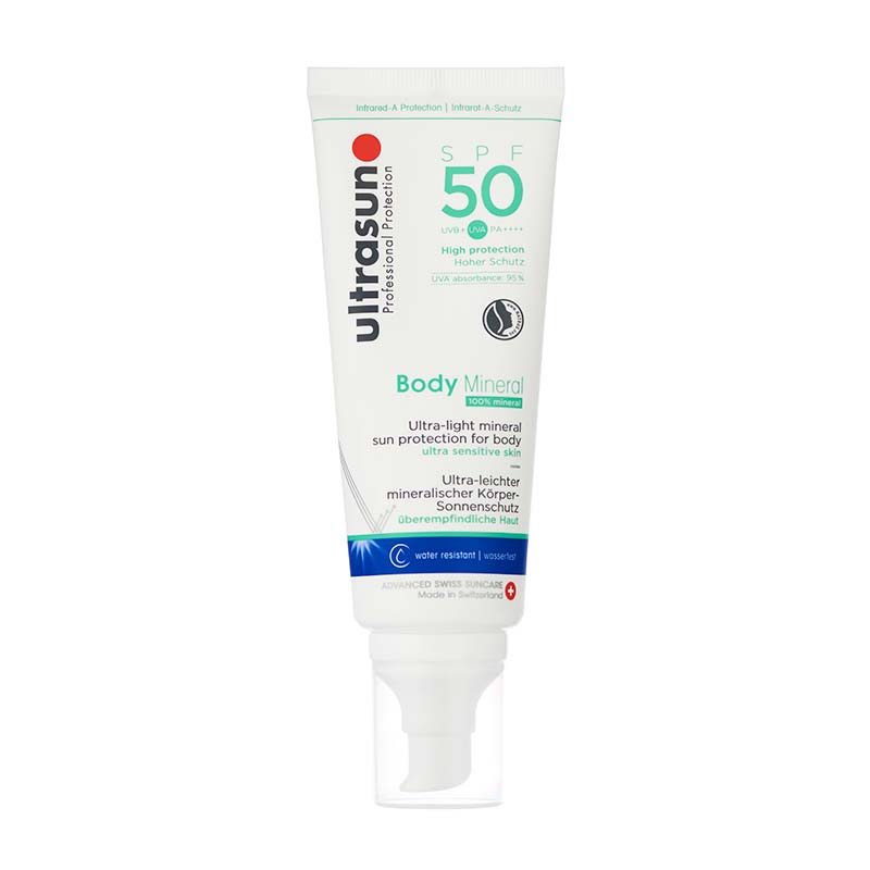 White tube of Ultrasun Mineral Baby SPF 50 sunscreen, featuring a green and blue label, indicating 100% natural ingredients and suitability for sensitive skin, with a flip-top cap.
