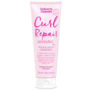Pink tube of Umberto Giannini Curl Repair and Grow Shampoo, 250ml, featuring bold white text and a sleek design, emphasizing curl care and repair.