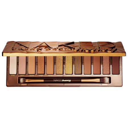 Urban Decay Naked Honey Eyeshadow Palette featuring 12 warm, honey-toned shades in matte and shimmer finishes, housed in a sleek gold case with a dual-ended brush.