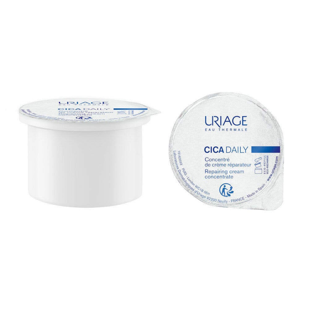 White jar with a lid, labeled "Uriage Cica Crema Concentrata Riparatrice Quotidiana," featuring a blue and white design, contains 50 ml of repairing cream.