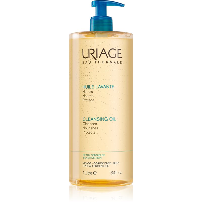 Clear plastic bottle of Uriage Cleansing Oil, 1000 ml, featuring a blue pump top and a golden liquid, labeled in both French and English for sensitive skin.