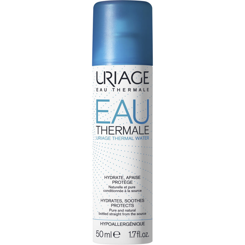 Clear spray bottle with a blue cap, labeled "Uriage Eau Thermale" in white and blue text, containing 50 ml of thermal water, designed to hydrate and soothe skin.