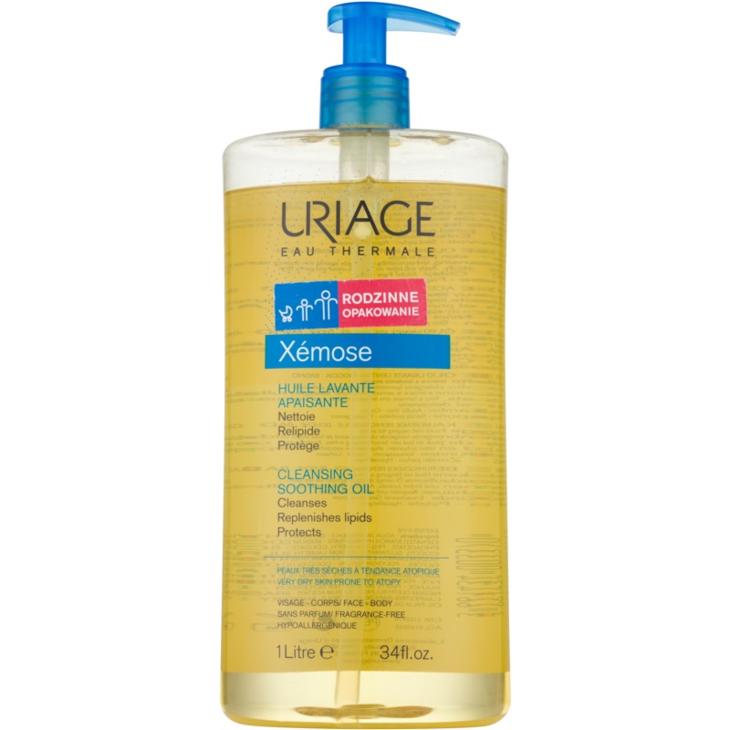 Clear plastic bottle of Uriage Xémose Soothing Cleansing Oil, 1L, featuring a blue pump dispenser, yellow liquid, and labels in multiple languages, including "Cleansing" and "Soothing."