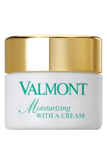 White jar with a gold lid, featuring turquoise text that reads "Valmont Moisturizing with a Cream," containing 50ml of rich, thirst-quenching cream.