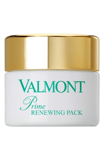 White jar with a gold lid, featuring green text that reads "Valmont Prime Renewing Pack," 1.7 oz/50 ml size, indicating a luxurious skincare product.